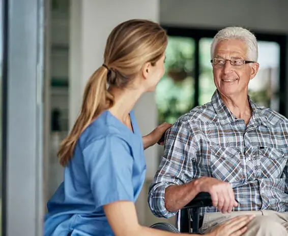 Woman in the healthcare sector is interacting with her happy client